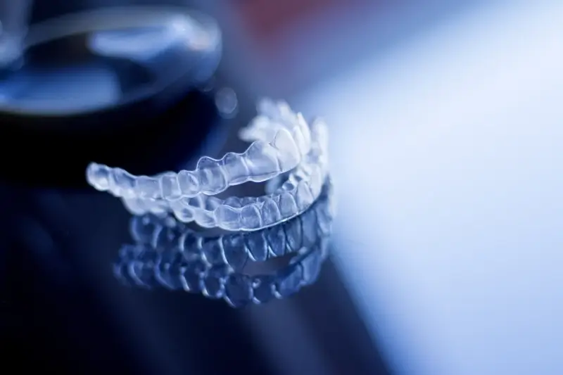 Czy leczenie Invisalign boli?